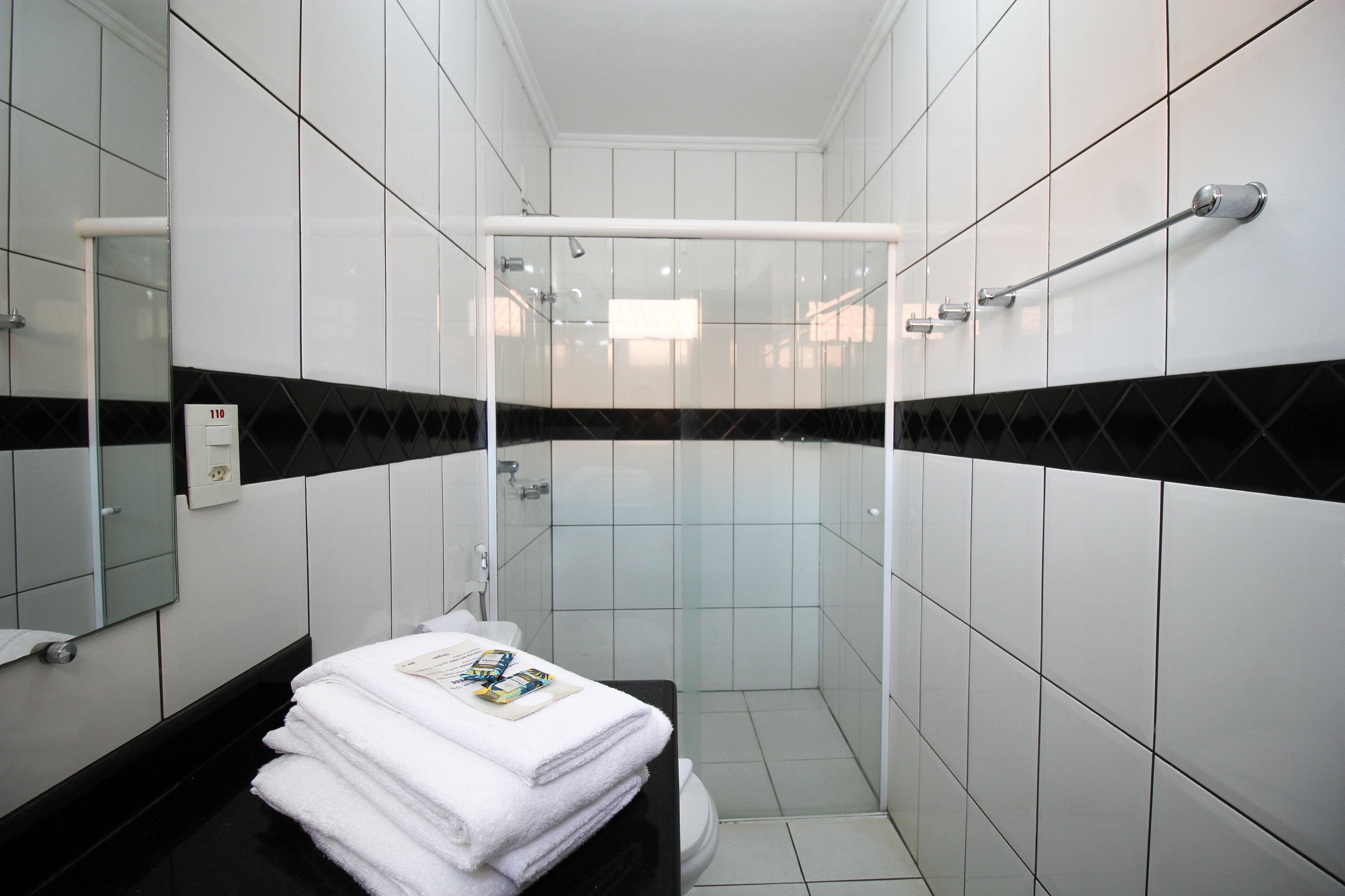 deluxe double room | bathroom | shower, free toiletries, towels, soap