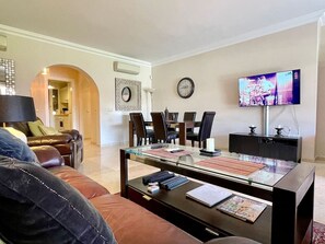 TV - Pool view private terrace ground floor Mijas Costa with barbecue by Solrentspain (Mijas Costa)