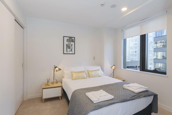 Apartemen, 2 kamar tidur | 2 kamar tidur, setrika/meja setrika, Wi-Fi gratis, dan seprai linen