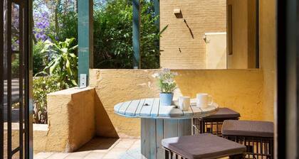 Suburban Two-bed Apartment with Parking and Patio