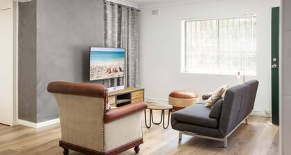 Suburban Two-bed Apartment with Parking and Patio