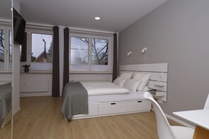 1 غرفة نوم ومكواة/لوح كي وواي فاي مجانًا وملاءات أسرّة