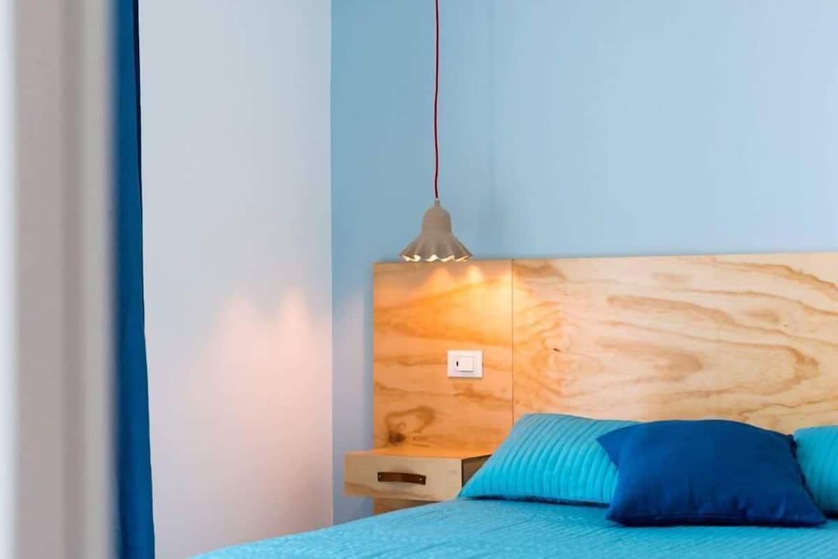 Superior tweepersoonskamer | Luxe beddengoed, bedden met traagschuimmatras, een minibar