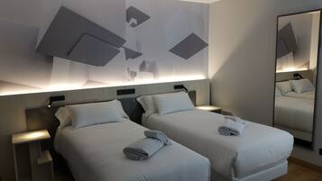 Literie de qualité supérieure, coffres-forts dans les chambres