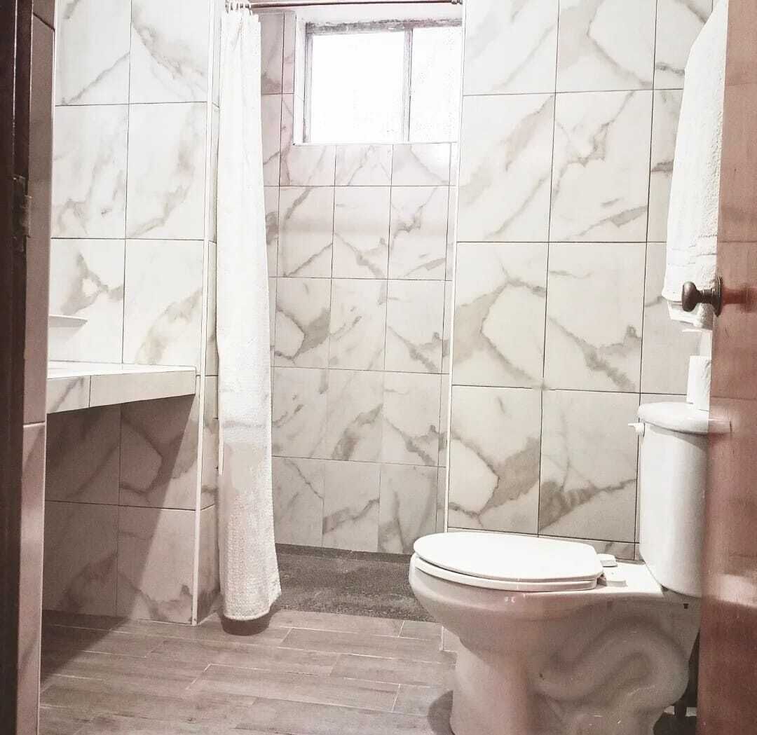 superior room | bathroom | shower, hair dryer, towels, soap