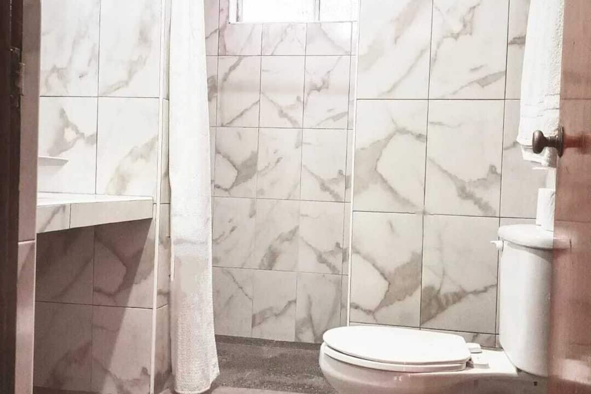 superior room | bathroom | shower, hair dryer, towels, soap