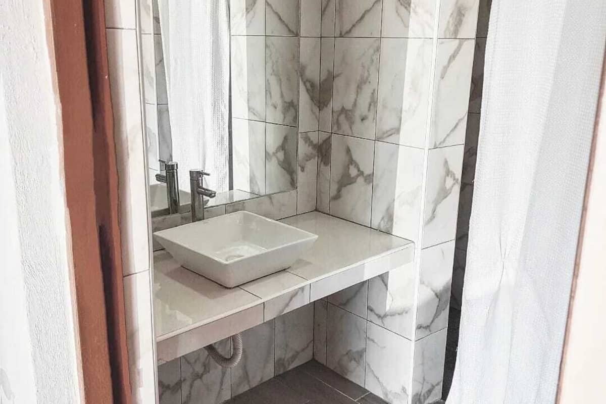 superior room | bathroom | shower, hair dryer, towels, soap