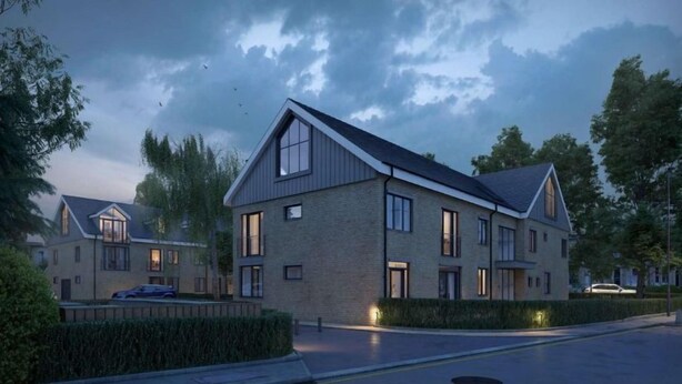 A modern two-story residential building with a brick facade, large windows, and a sloped roof. - 14 St Johns Mews - sleeps 3 guests  in 1 bedroom (York)