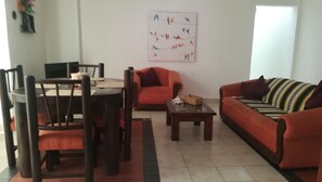 Apartment | Living area | Flat-screen TV - Playa Centro 202 (Playa del Carmen)