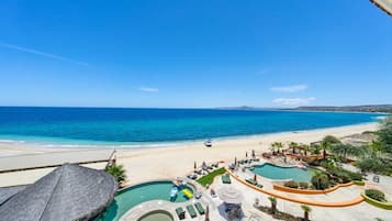 On the beach, sun loungers, beach towels