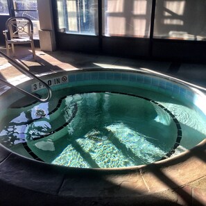 A swimming pool with a sign indicating '3 FT 0 IN' depth. - Water's Edge - Ocean Front, Indoor/Outdoor Pool, Spa (Carolina Beach)