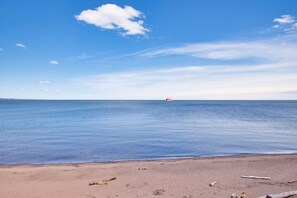 On the beach, sun-loungers, beach towels