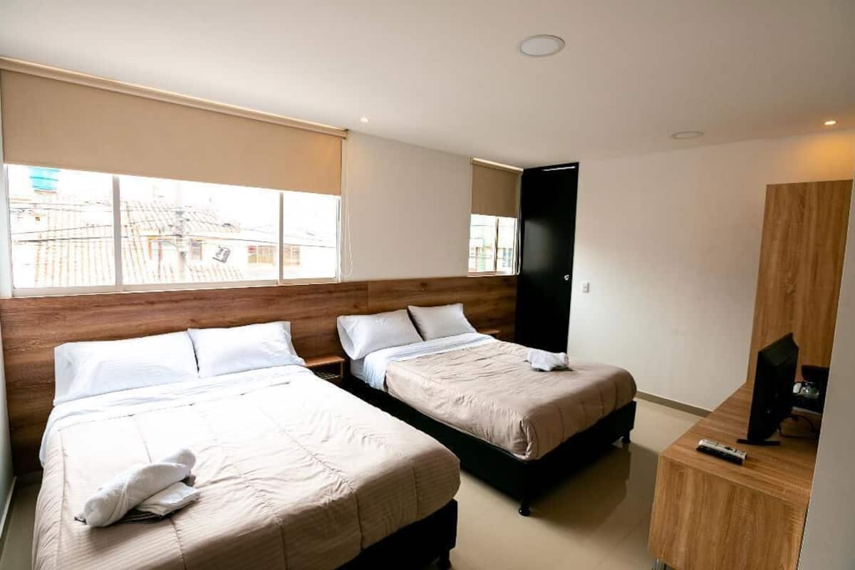 Family Quadruple Room, 2 Double Beds | Iron/ironing board, free WiFi, bed sheets