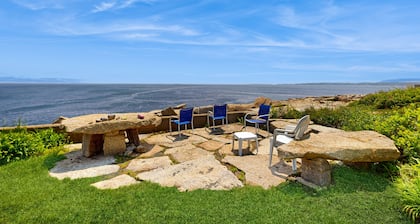 Lakaistaan, koiraystävällinen, rantahotelli kotiin, jossa aurinkohuone, merinäköala ja takat