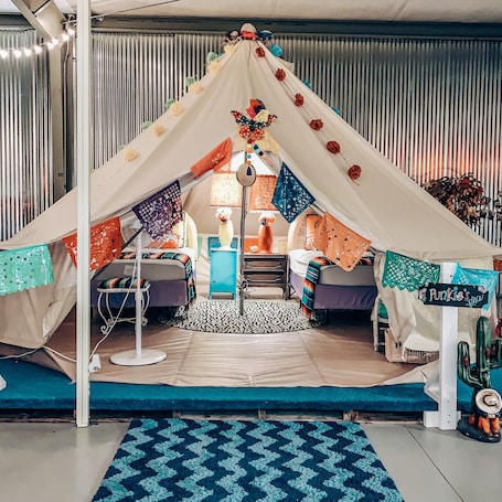 Basic Cabin | 10 bedrooms, free WiFi, bed sheets. Lone Star Glamp Inn
