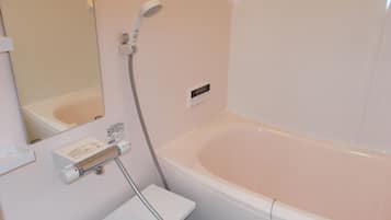Twin Room | Bathroom | Hair dryer, slippers, towels