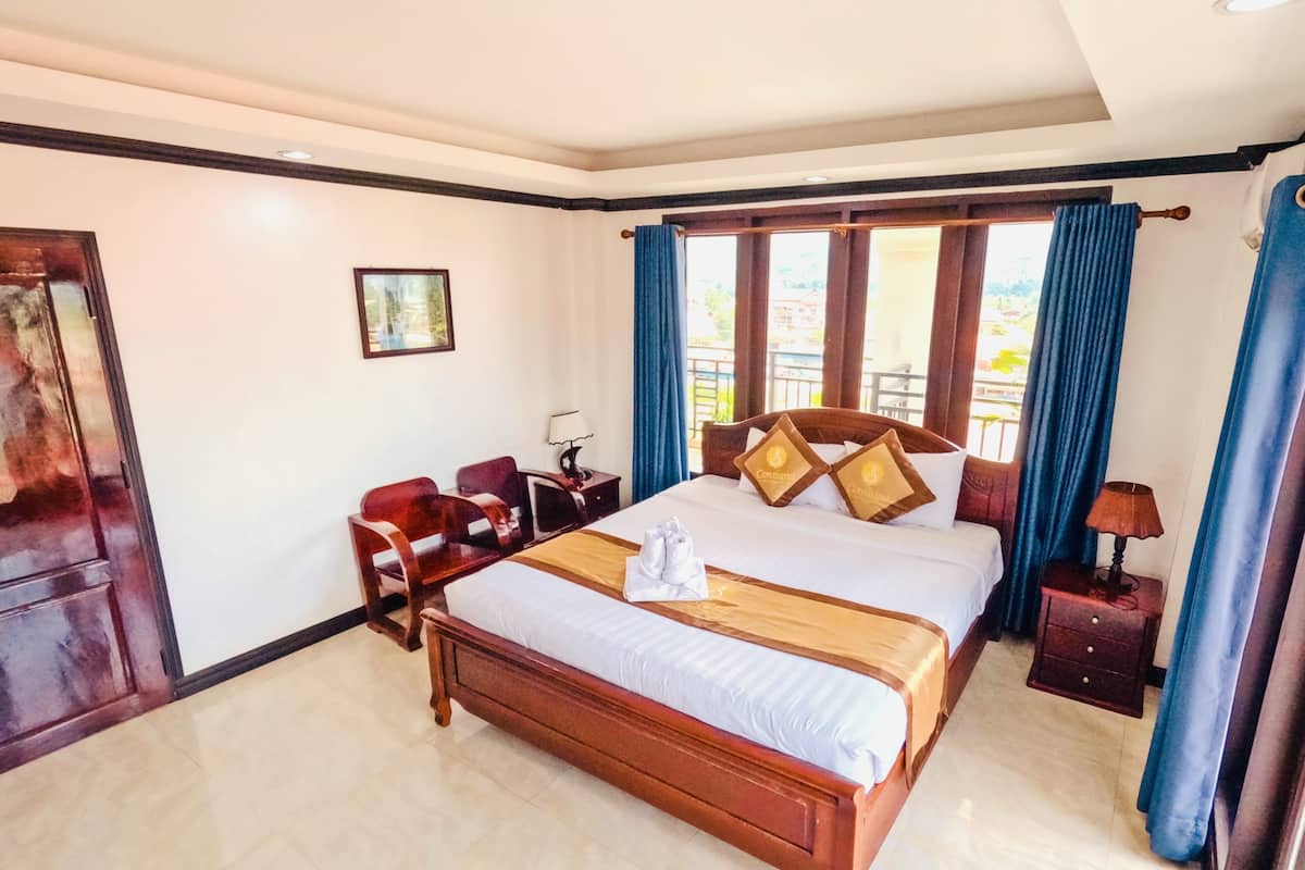 Deluxe Double With Balcony | Free minibar items, in-room safe, laptop workspace, free WiFi