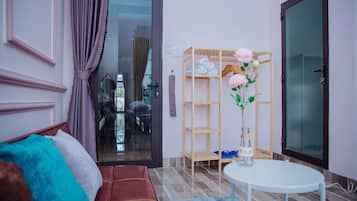 City Double Room | Living area | Flat-screen TV