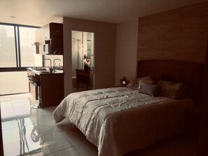 Egyptian cotton sheets, premium bedding, down comforters - Only Suites San Juan (Guadalajara)