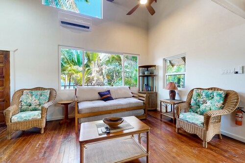 Romantic beachfront home with ocean views, dock, free WiFi, and outdoor dining