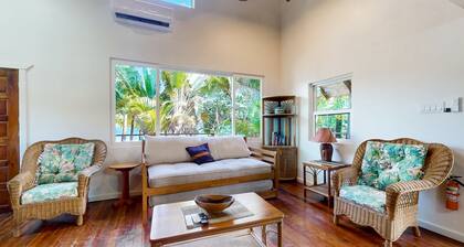 Romantic beachfront home with ocean views, dock, free WiFi, and outdoor dining