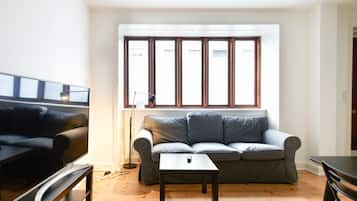 Departamento, 1 habitación, vista a la ciudad | Sala de estar
