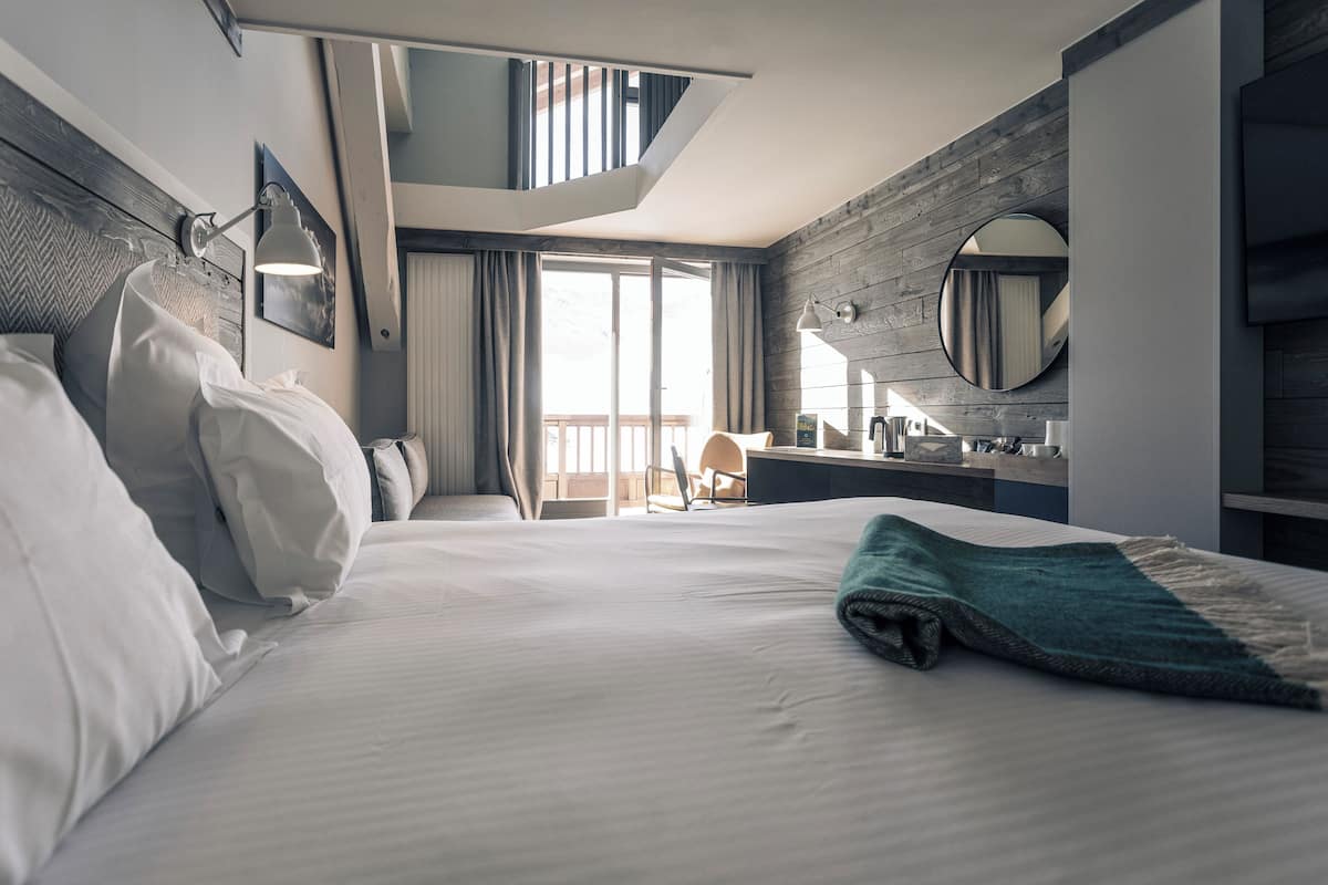 Suite, en duplex | Een minibar, een kluis op de kamer, individueel gedecoreerd