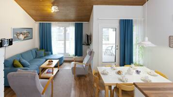 Apartment, 2 Bedrooms, Sauna (68 m2) | Living area | 32-inch flat-screen TV with digital channels