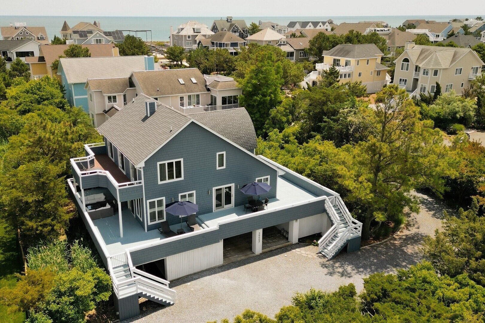 Located oceanside just steps from the beach in one of North Bethany''s sought after private gated communities, this home also features stunning water views of the Indian River Bay!