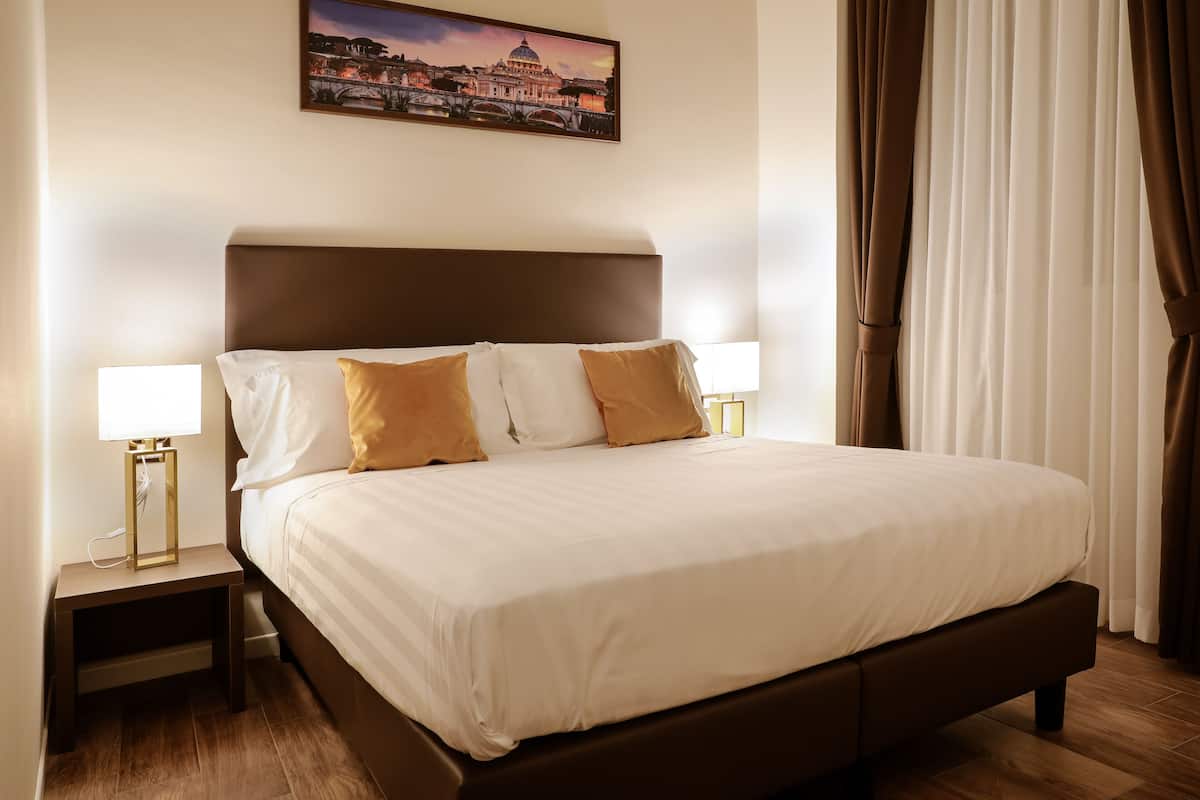Premium bedding, down comforters, memory foam beds, minibar