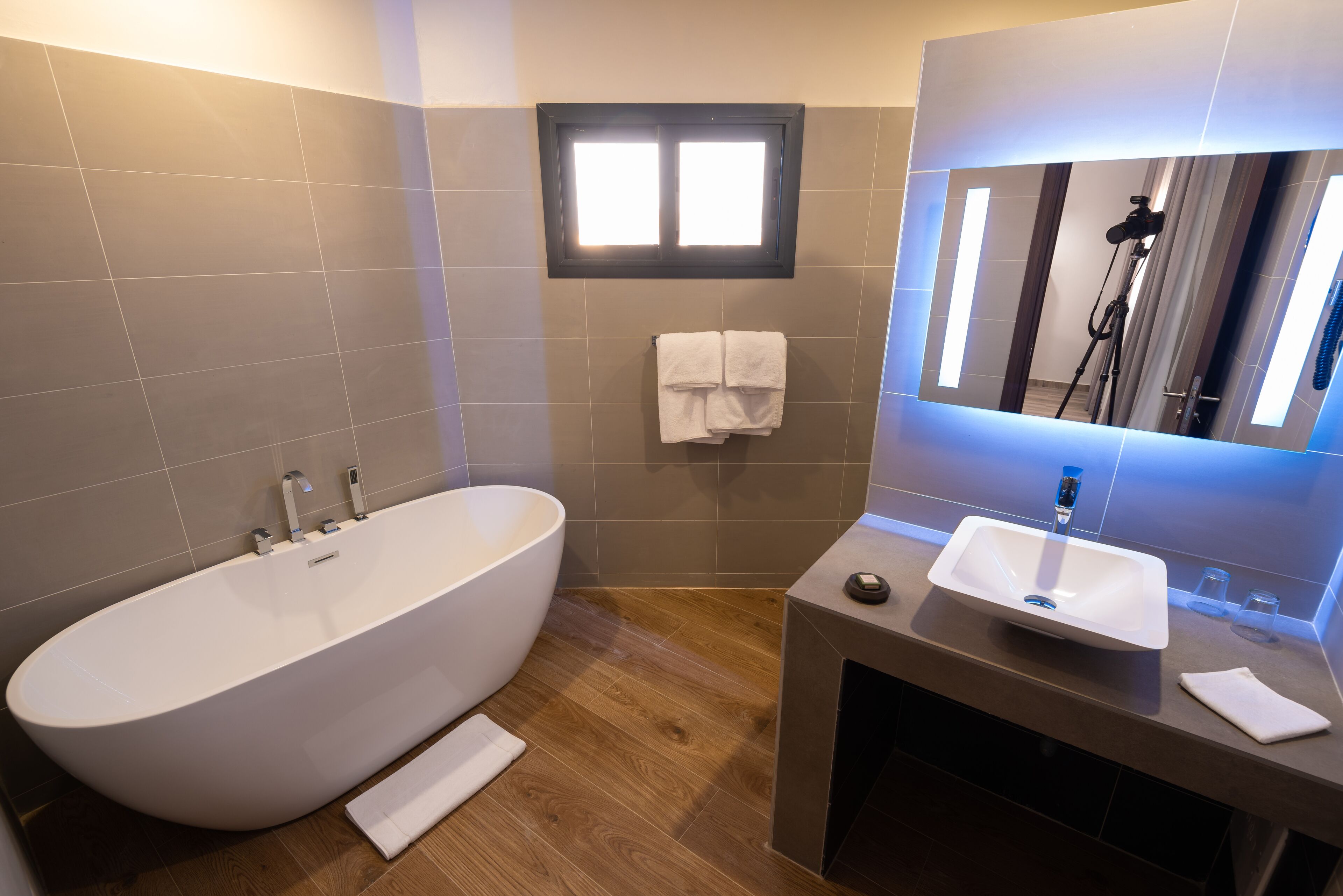 junior suite | bathroom | rainfall showerhead, towels, soap, toilet paper