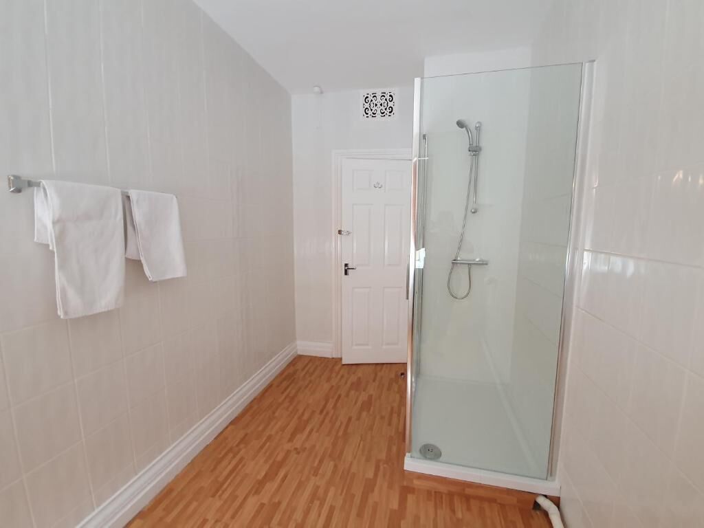 basic quadruple room | bathroom shower