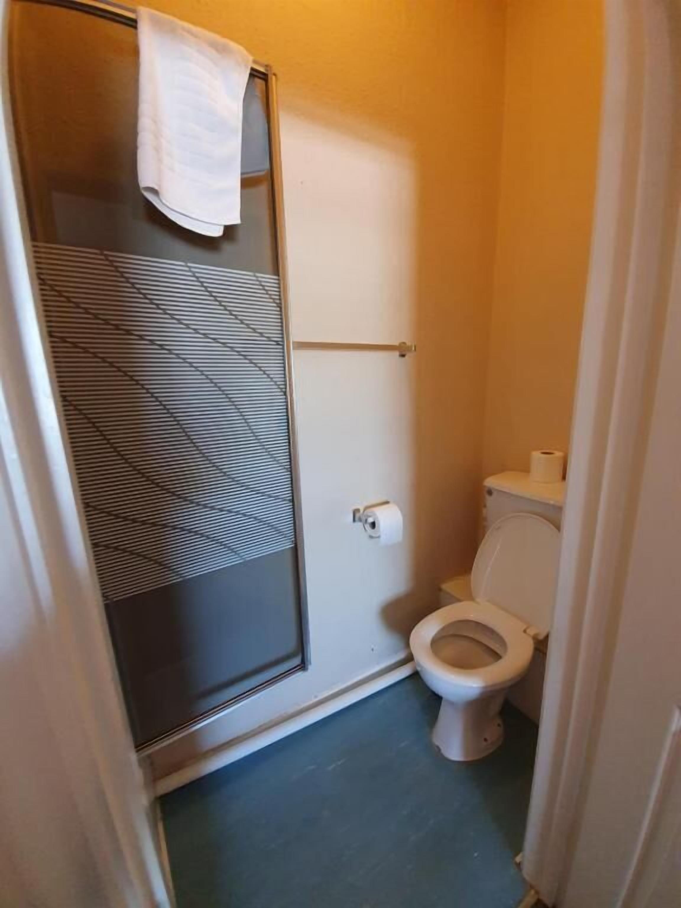 family room with bathroom | bathroom | free toiletries, hair dryer, towels, soap