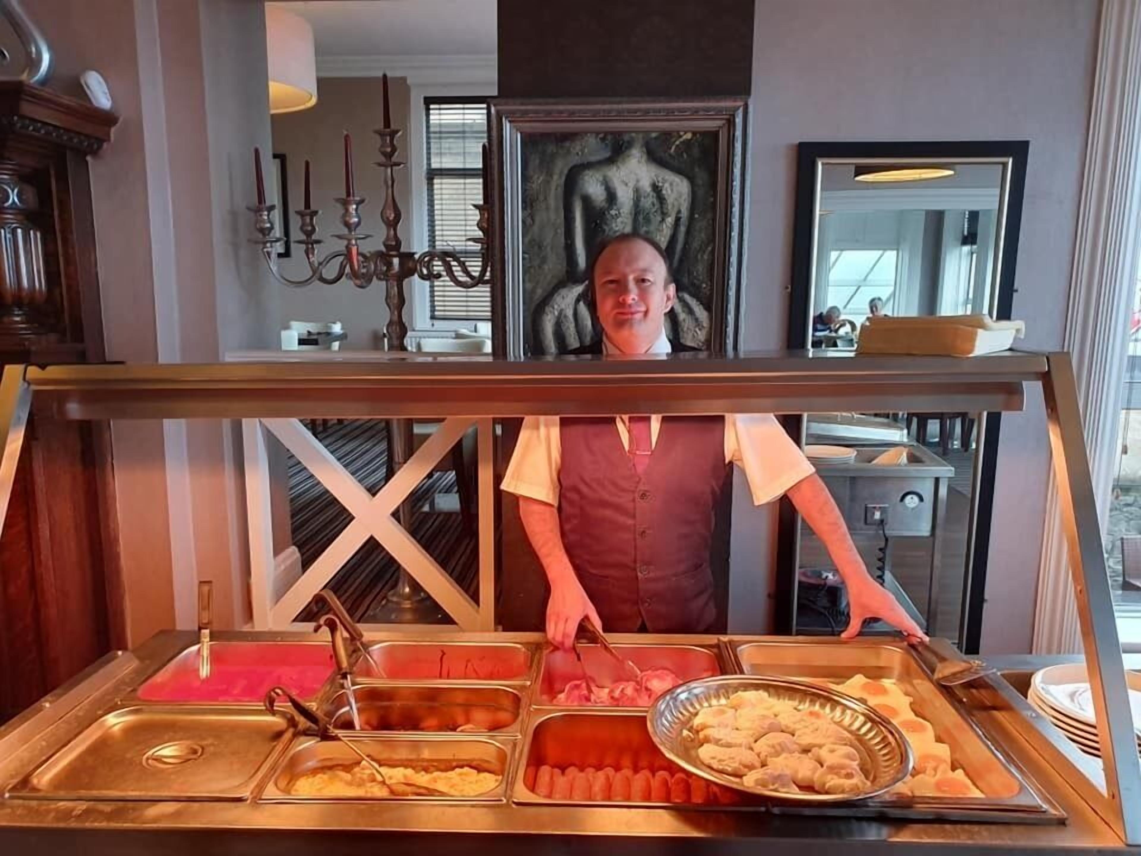 daily buffet breakfast (gbp 12.95 per person)