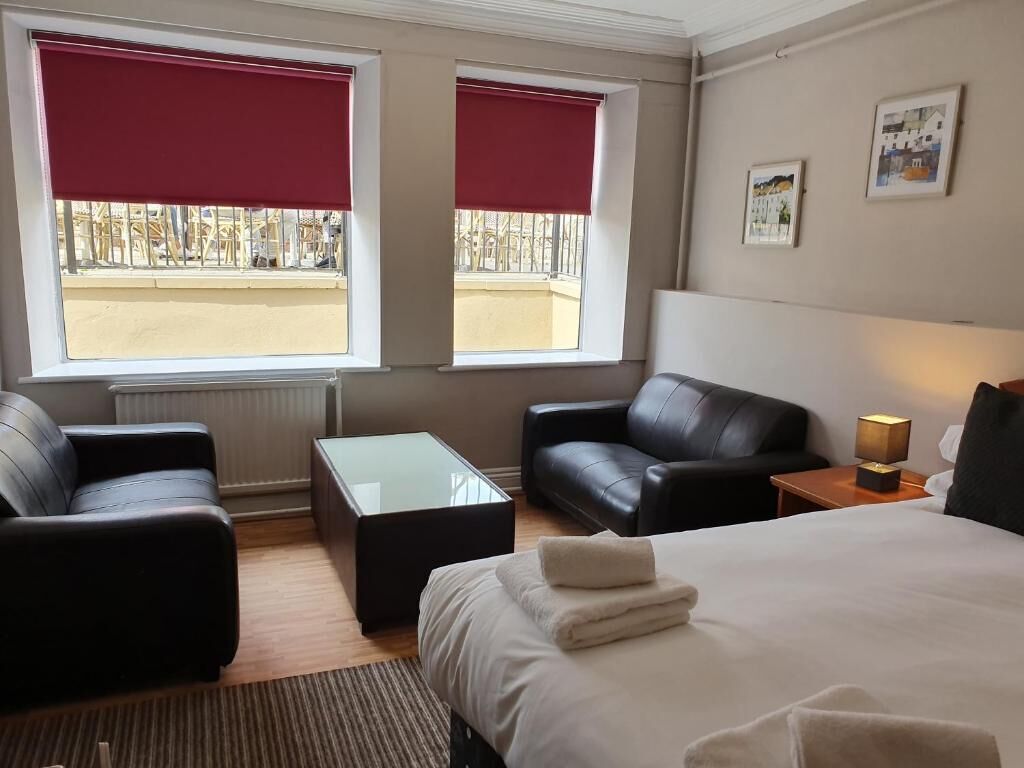 basic quadruple room | living area | 24-inch flat-screen tv with digital channels, tv