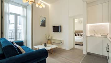 Apartment, 1 Bedroom | Living area | TV
