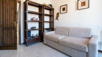 Duplex, 3 Bedrooms | Living area | Flat-screen TV