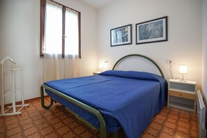 Apartment, 2 Bedrooms | 2 bedrooms, cribs/infant beds, WiFi - Villetta Capuana (Comacchio)