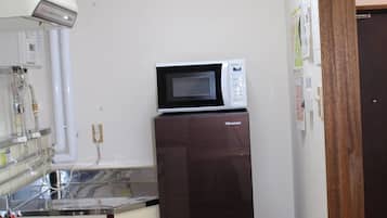 Fridge, microwave, cookware/dishes/utensils
