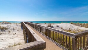 A wooden boardwalk leading to a beach with clear skies. - "Commodores 101" | Corner Unit w/ Beach Views | Community Pool | Beach Chairs included (Santa Rosa Beach)