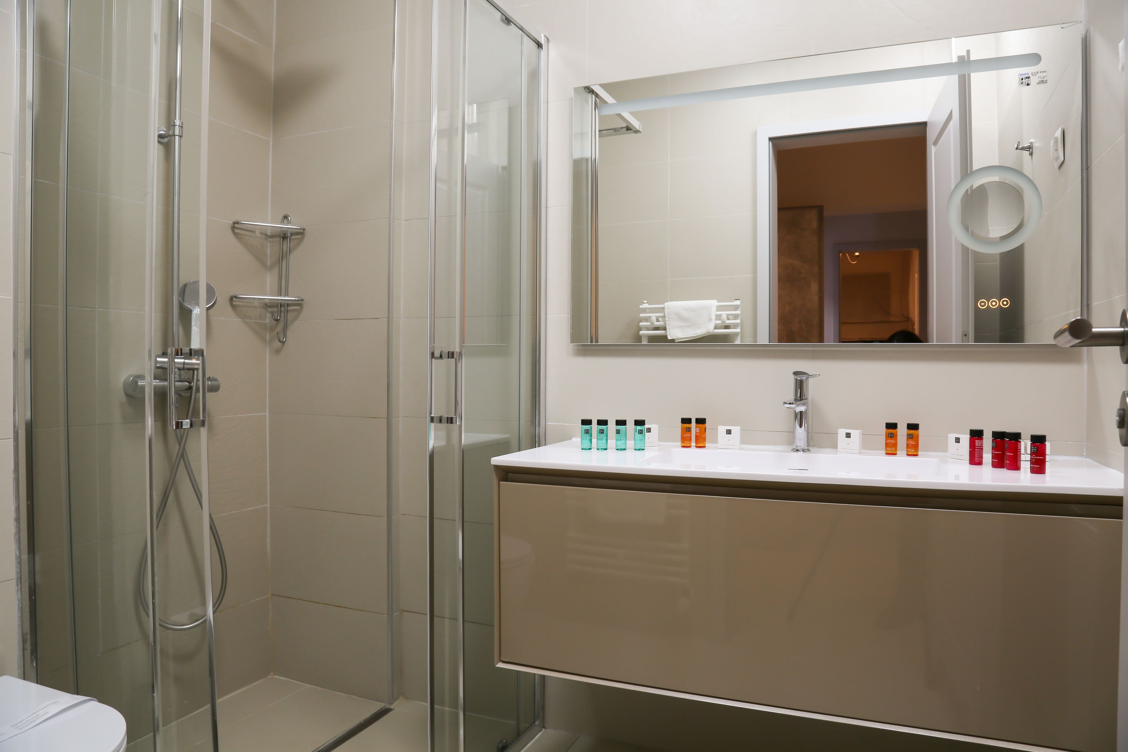 Shower, free toiletries, hair dryer, slippers