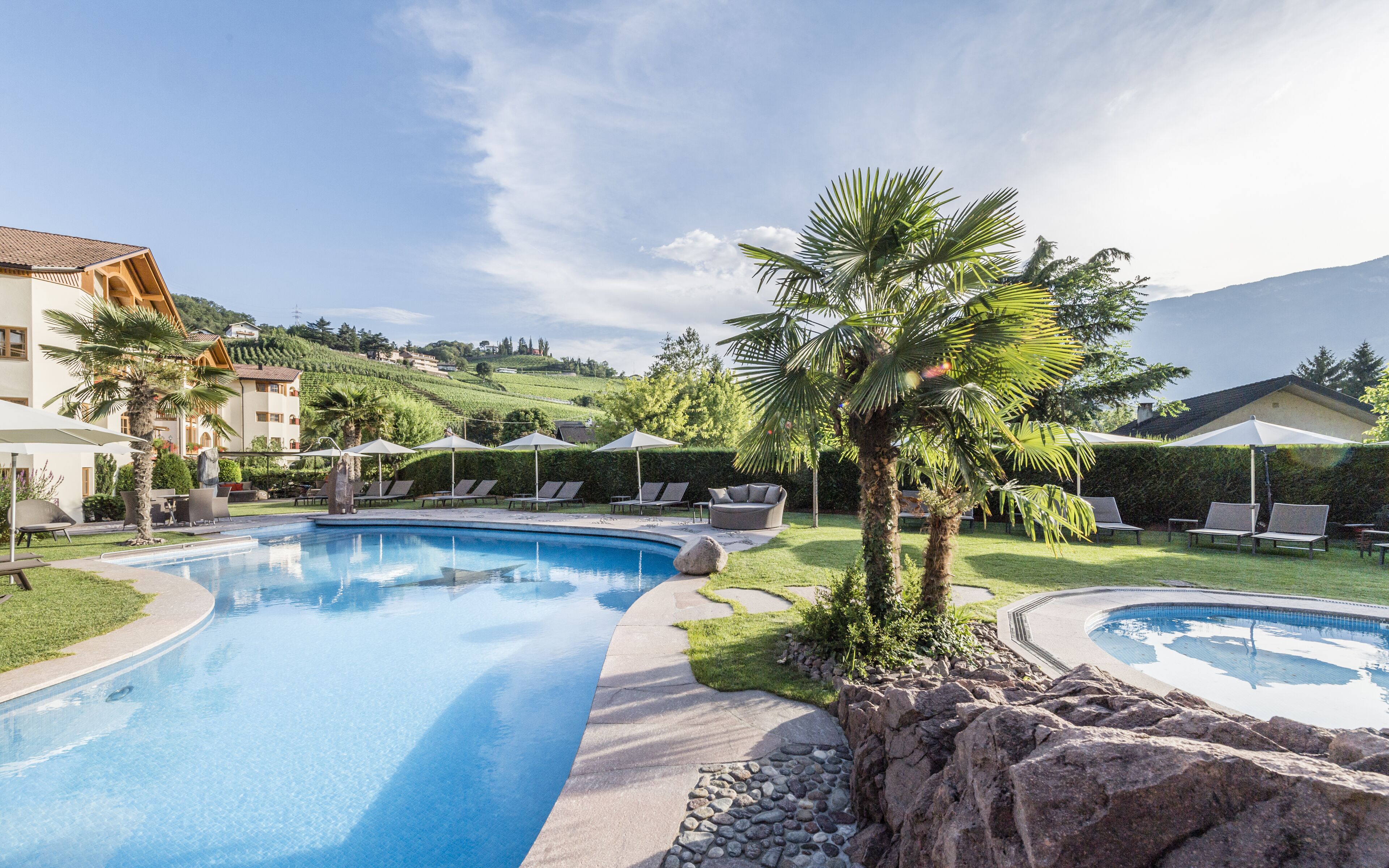 Indoor pool, seasonal outdoor pool, pool umbrellas, pool loungers