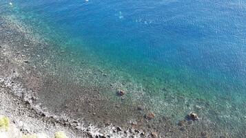 On the beach, sun loungers