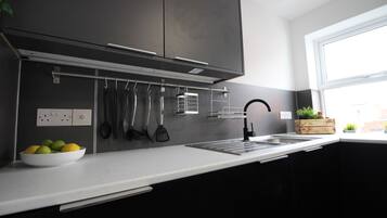 Apartment 8 No.24 St Thomas Road | Private kitchen | Fridge, microwave, oven, cookware/dishes/utensils