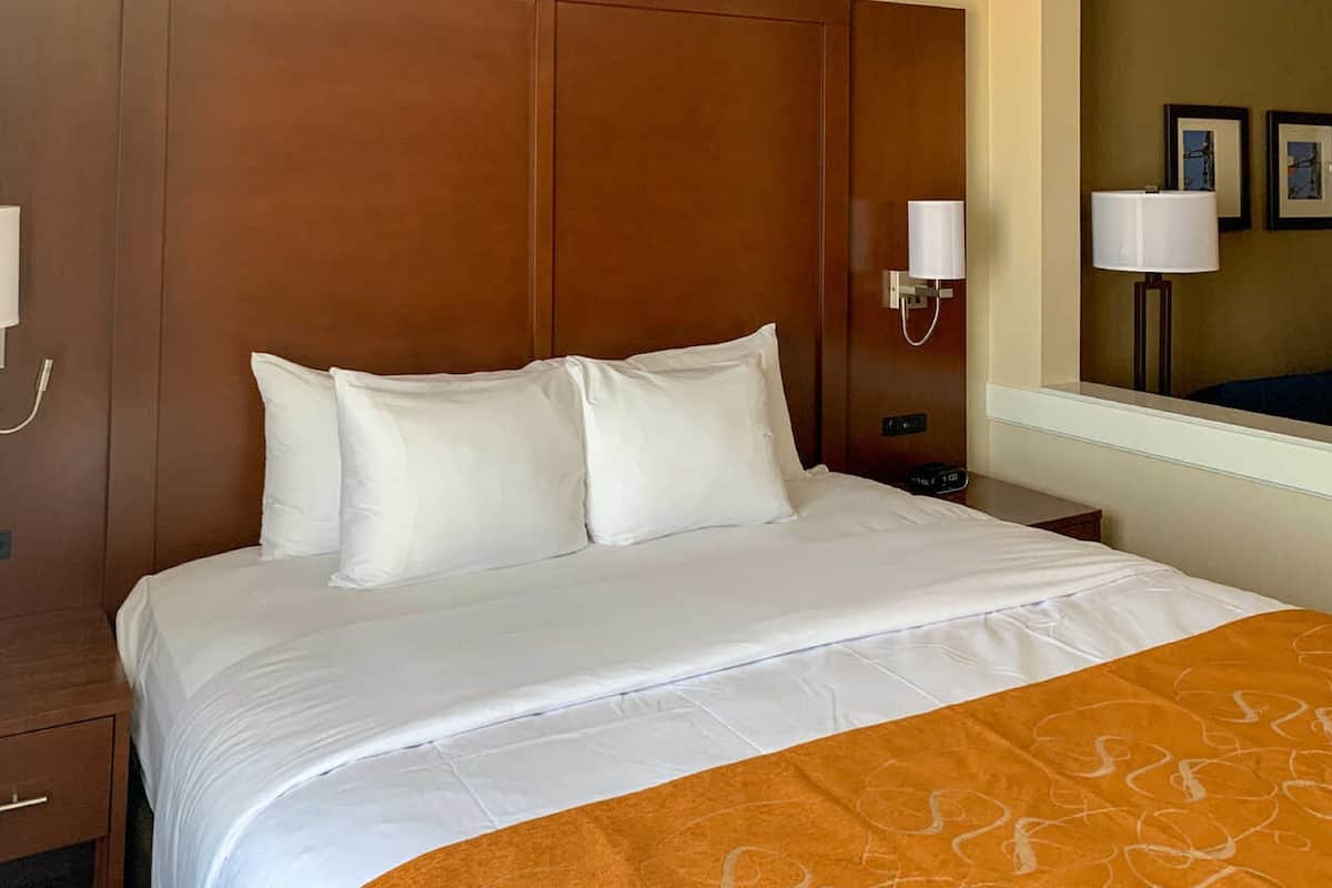 desk, laptop workspace, blackout curtains, iron/ironing board