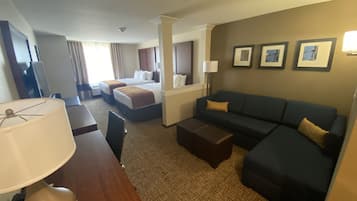 Suite, Multiple Beds, Non Smoking | Desk, laptop workspace, blackout curtains, iron/ironing board