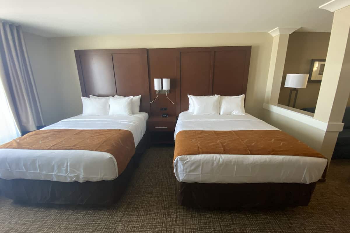 suite, multiple beds, accessible, non smoking | desk, laptop workspace, blackout curtains, iron/ironing board