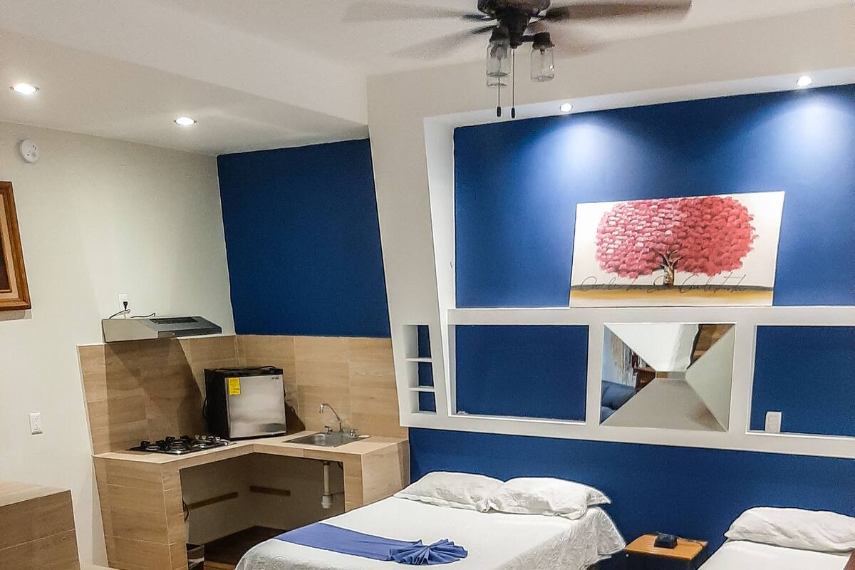Superior Double Room, 2 Queen Beds, Kitchenette, Courtyard Area | Down duvets, individually decorated, individually furnished