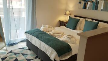 Design Apartment, 1 Bedroom, Lake View | 1 bedroom, Frette Italian sheets, premium bedding, down comforters