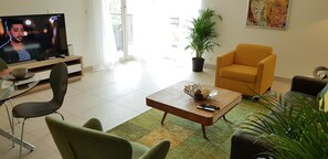 Design Apartment, 1 Bedroom, Lake View | Living room | 55-inch flat-screen TV with cable channels, Smart TV, pay films - Montreux lake view Residence (Montreux)